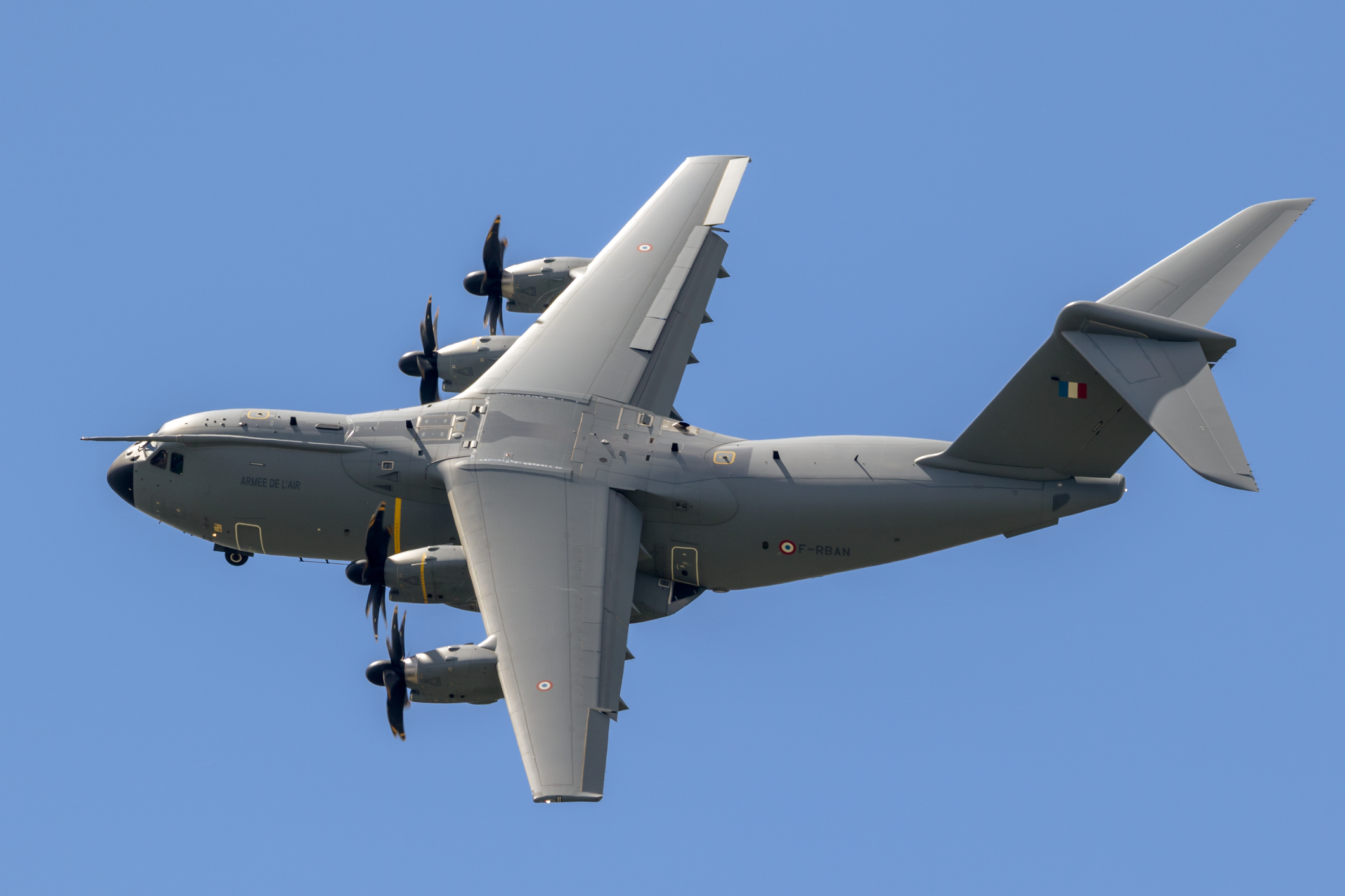 Paris - Jun 21, 2019: French Air Force Airbus A400M military transport plane banking in flight before touch down.