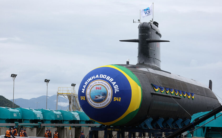 People stand during the launching of the third Scorpene-class diesel-powered submarine built in Brazil with French technology, at the Itaguai shipyard in Rio de Janeiro state, Brazil March 27, 2024. REUTERS/Pilar Olivares