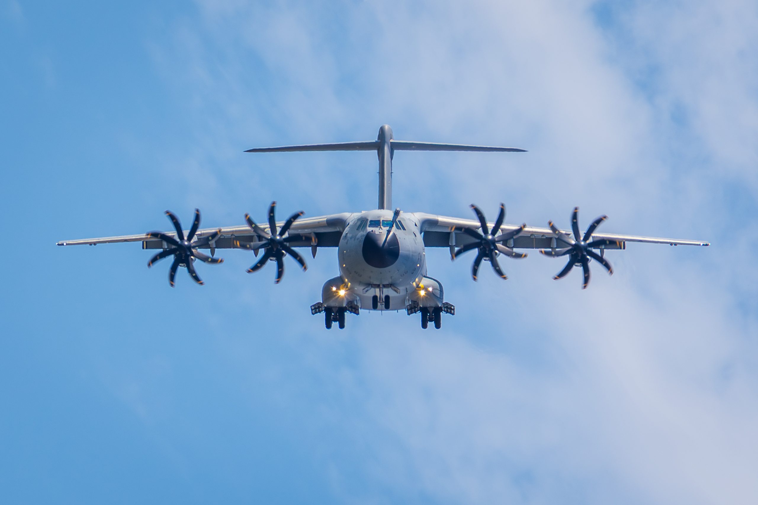 Dugny, France - June 20, 2025: Front view of a French Air and Space Force Airbus A400M Atlas, the European four-engine military transport aircraft, in flight over Paris-Le Bourget airport.